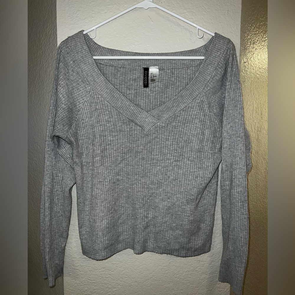 Long sleeve sweater like top. Very soft, off shoulder, knitted.
